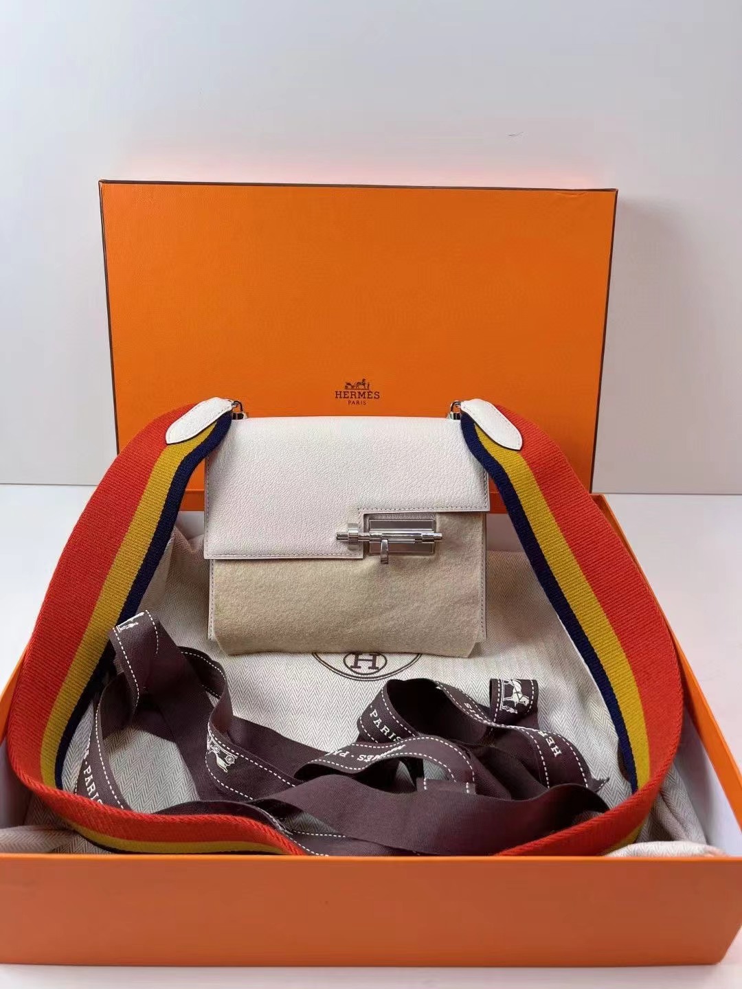Hermes 爱马仕 全新nata奶油白手枪包mini